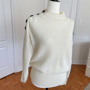 Cozy High-Neck Cream Sweater with Button Detail on Right Shoulder